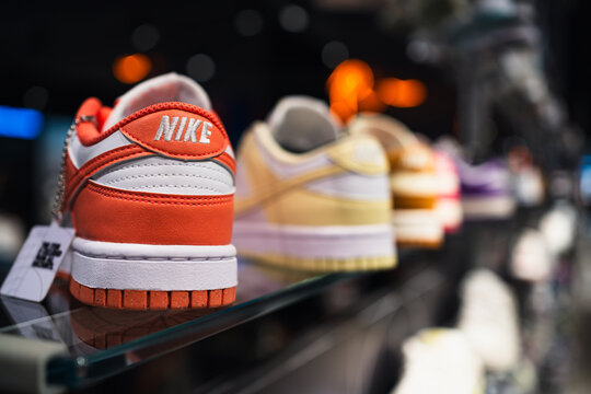 Bangkok, Thailand - September 12, 2024: Nike Dunk Low shoes with nike logo on a display in Nike shop.