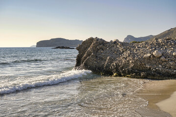 Landscape with large rocks on the sandy beach