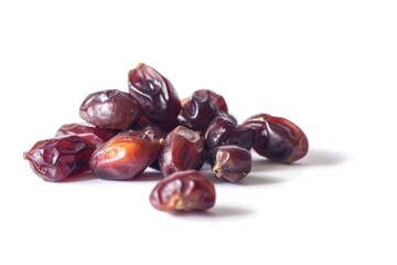 A collection of fresh fruits arranged on a white surface