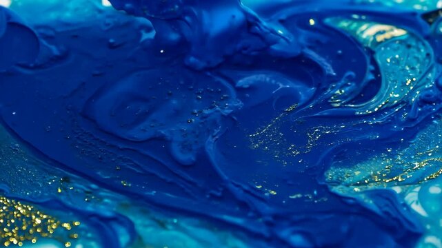 Thick colorful liquid flowing on a white background. Close-up. Abstract art