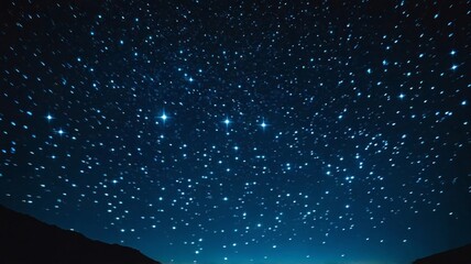 Starry Night Sky Over Silhouetted Landscape With Countless Twinkling Stars