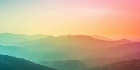 Fototapeta premium A serene landscape of colorful mountains at sunset, showcasing vibrant hues blending beautifully in the sky.