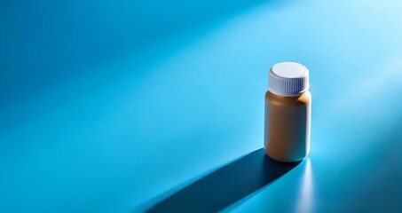A simple bottle of medicine casting a shadow on a bright blue background.