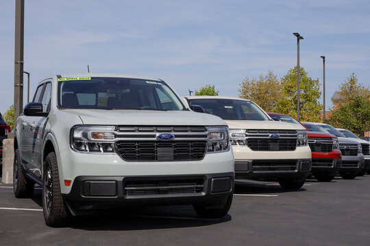 Ford Maverick display at a dealership. Ford offers the Maverick in XL, XLT, Lariat and Hybrid models. MY:2024