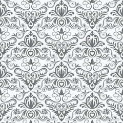 Ornate grey floral pattern with swirls, suitable for backgrounds or textiles.