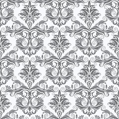 A decorative grey floral pattern on a white background, suitable for wallpaper or fabric design.