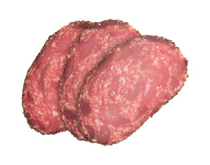 smoked sausage salami with black paprika cut into pieces isolated on white background with clipping path, top view, flat lay