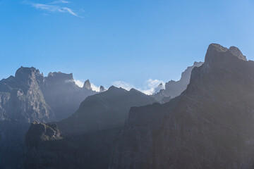 Panoramic view of Pico Ruivo over Curral das Freiras on Madeira island on a bright early morning