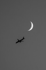 airplane in the night sky