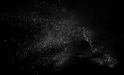 White powder scattered on black background, clipping path