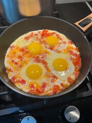 fried eggs in a pan