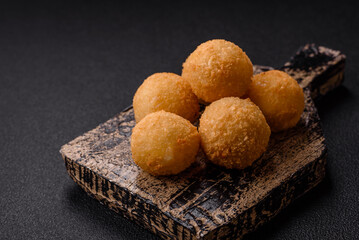 Fast food cheese balls breaded with salt and spices
