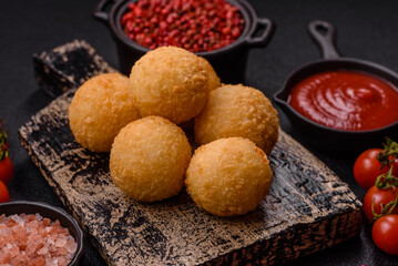Fast food cheese balls breaded with salt and spices