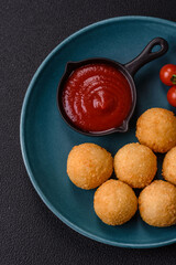 Fast food cheese balls breaded with salt and spices