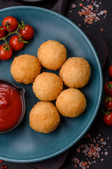 Fast food cheese balls breaded with salt and spices