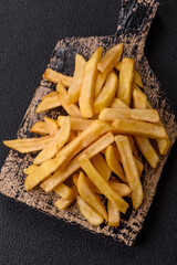 Fast food french fries with salt and spices