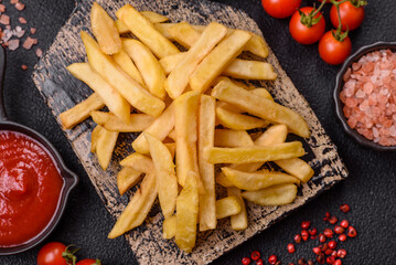 Fast food french fries with salt and spices