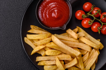 Fast food french fries with salt and spices
