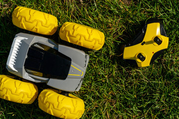 yellow jeep with remote control toy on green grass
