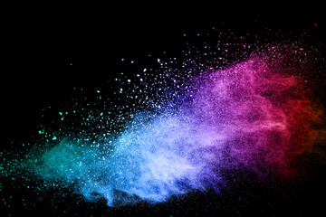 abstract colored dust explosion on a black background.abstract powder splatted background,Freeze...