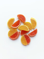 Сolored marmalade gummy candies lemon orange slices on white background
