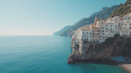 Atrani town with its quaint buildings perched on the cliffside, overlooking the crystal-clear waters of the Amalfi Coast. The scene should feature lush greenery and colorful houses
