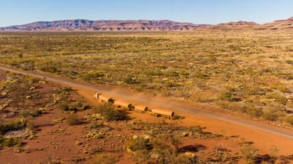 Drone photography on a road train on the side of the road in the outback
