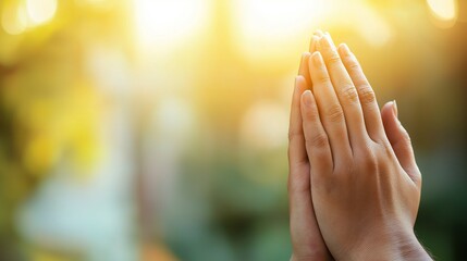 Serene woman praying under warm sunlight, surrounded by blurred nature, evoking feelings of faith, hope, and spirituality.  Woman, praying, faith, hope, spirituality, meditation, gratitude