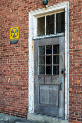 Old Door with Fallout Shelter Warning