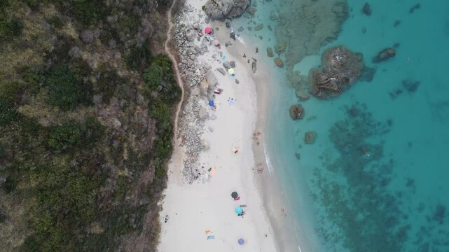 Tropical beach in Italy, Calabria, Tropea. A 4K drone video of the sea, sky, and beach on the Coast of the Gods.