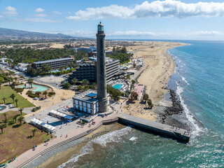 Aerial view of Maspalomas lighthouse and sand dunes, Gran Canaria, Spain.The seafront at Punta de...