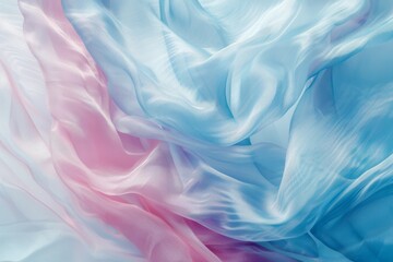 Obraz premium Elegant pastel-colored fabric drapes in a soft blend of blues and pinks, creating a serene and graceful visual display.