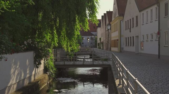 Old historic town Freising and their canals on the River Isar in Bavaria, Germany. Freising is city in Deutschland, regional center, located in Bayern. Water canals in an ancient Eupropean city. 