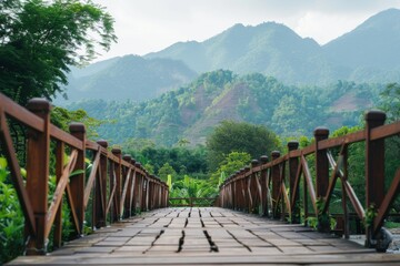 A charming boardwalk leads towards verdant mountains, creating a sense of adventure and connection with nature.