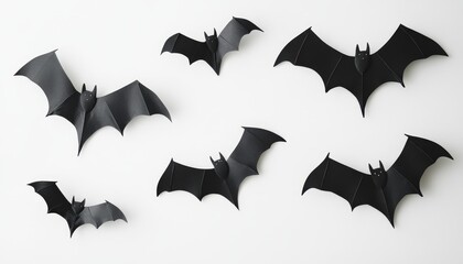 Fototapeta premium Halloween decoration featuring bats against a clean white background for spooky atmosphere
