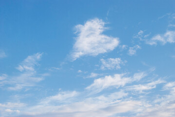 nature made a heart from the clouds in the blue sky