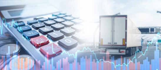 Logistics costs. Truck is driving along road. Calculator with coins on accountant desk. Logistics...