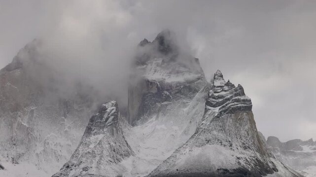 a close up zoom in shot of cuerno oriental peak at torres del paine national park in patagonia, chile