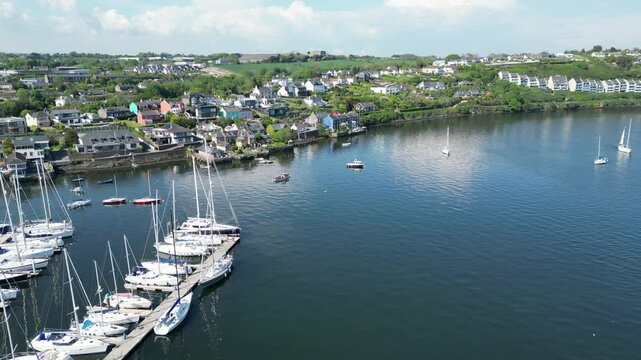 Kinsale, Ireland, with boats moored and the town area from a UAV