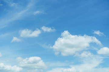 Obraz premium Fantastic soft white clouds against blue sky background