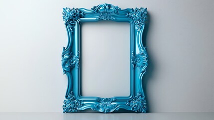 A striking blue ornate picture frame stands out against a crisp white wall.