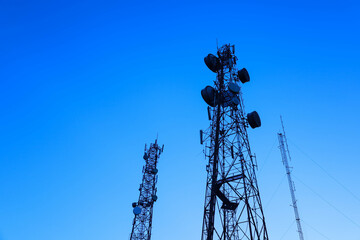 Telecommunication tower silhouette. Telecommunication tower with wireless technology equipment...