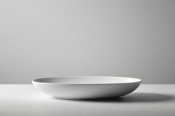 a white bowl on a table                               