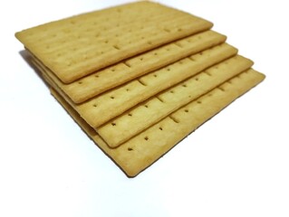 Crispy and savory salty cheese biscuits with roast beef flavor on a white background