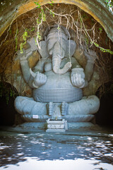 Ganesha Statue seated on a human skull Carved from volcanic rock located in Bali Safari Marine...