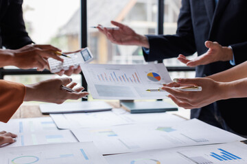 Analyze financial data and accounting record with calculator in meeting office, Accounting company charts and graphs banner, double exposure successful business finance and taxation planning concept. 