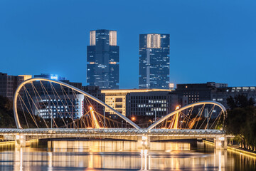 Night Scenery of Greenland Twin Towers and Jiuru Road Bridge in Zhengzhou, Henan Province, China