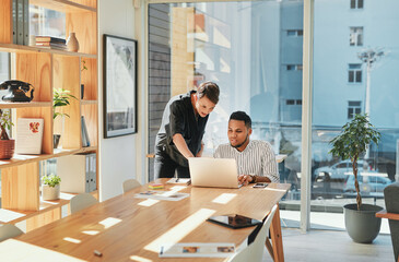 Creative, collaboration and business people with laptop in boardroom for design strategy, online...