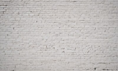 A white brick wall with a uniform pattern and a small amount of mortar visible between the bricks.