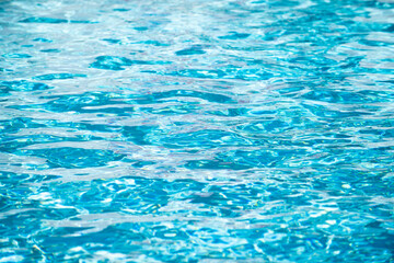 Blue ripped water in swimming pool, water pool texture and surface water backgraund.